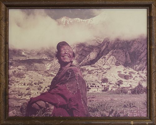Wood-framed 12" x 16" photograph of a monk in
either Nepal or Tibet - photographer and date taken
unknown.

Given to a person who assisted as a thank you gift in
1973 by Werner Erhard who signed his name on the back.